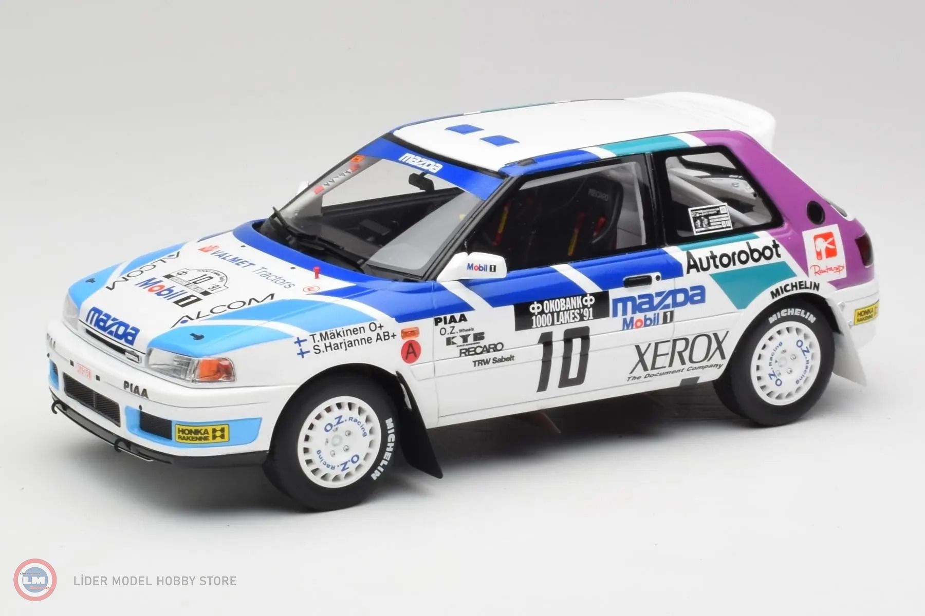 1:18 OTTO Mazda 323 GTX #10 GrA 1000 Lakes Rally 1991