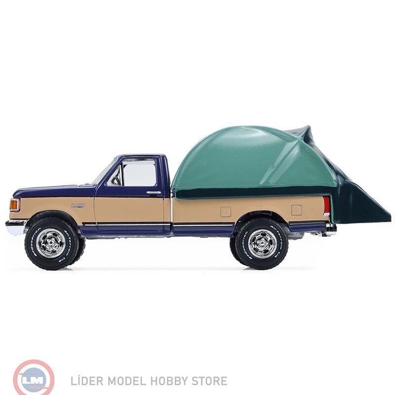1:64 Greenlight 1987 Ford F-150 XLT Lariat in Dark Blue and Tan with Modern Truck Bed Tent