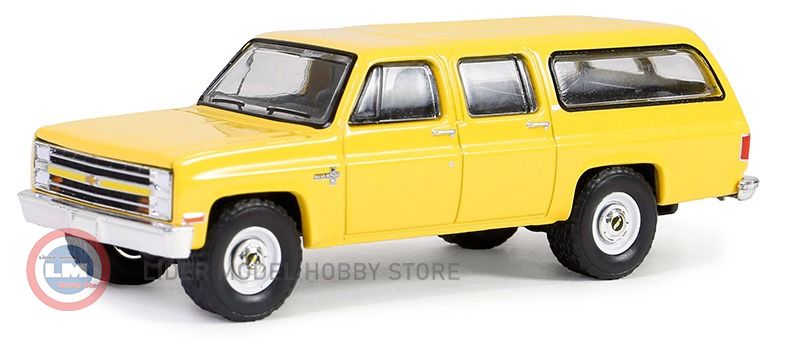 1:64 Greenlight 1987 Chevrolet Suburban K20 Custom Deluxe in Construction