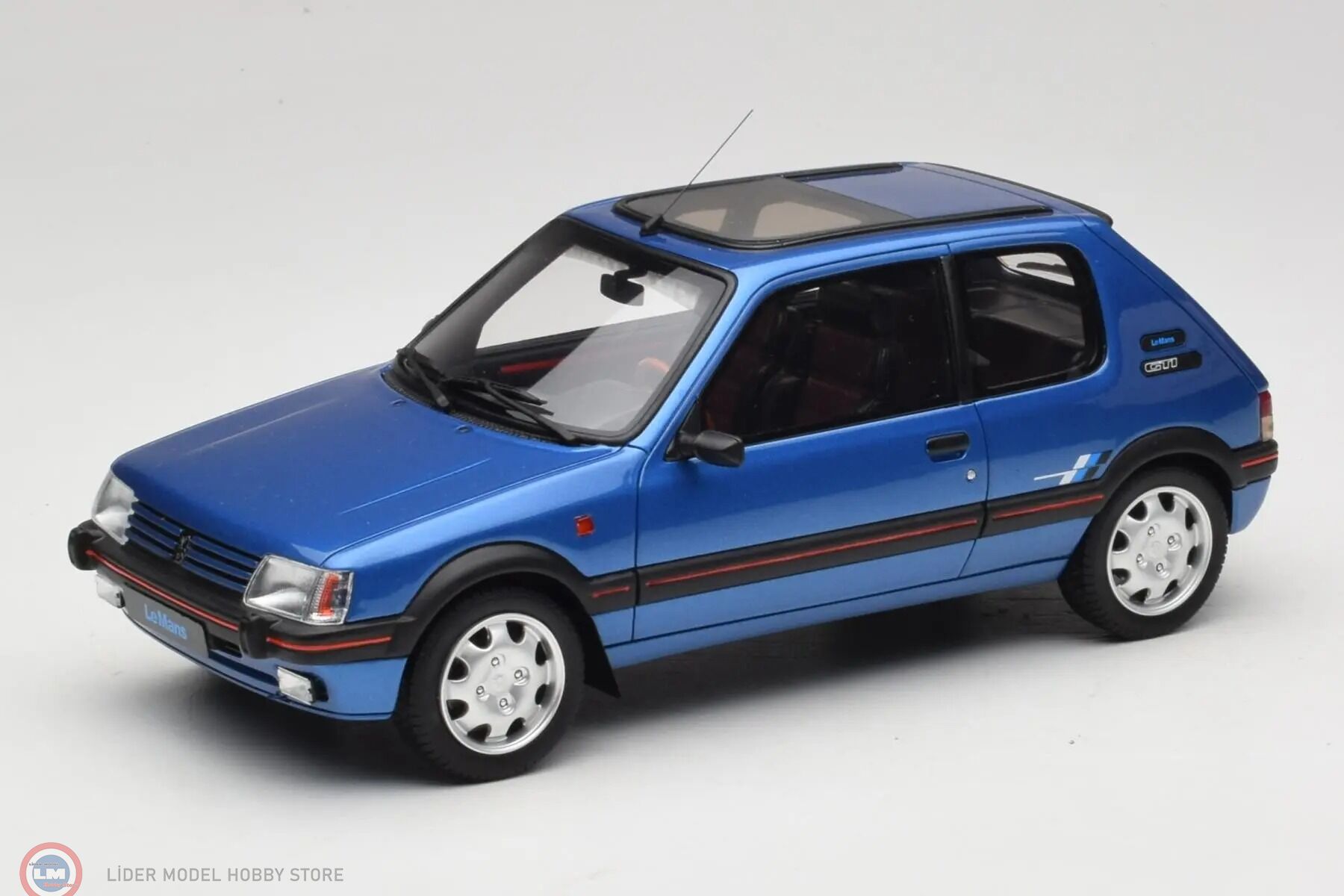 1:18 OTTO 1991 Peugeot 205 1.9 GTI Le Mans Miami Blue
