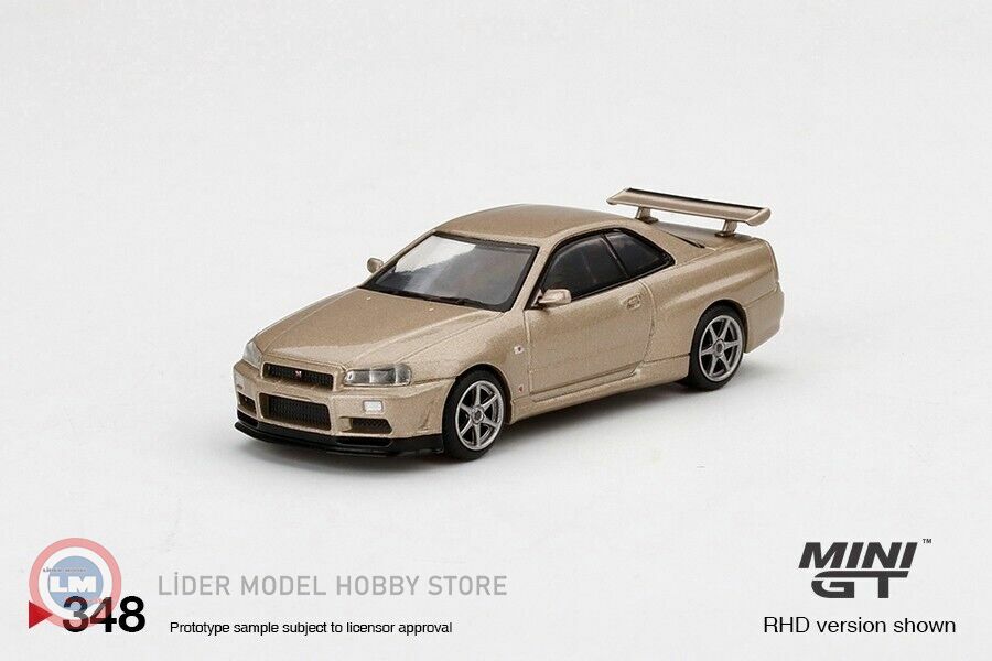 Mini GT - 1:64 Nissan Skyline GT-R (R34) M-Spec Silica Breath RHD